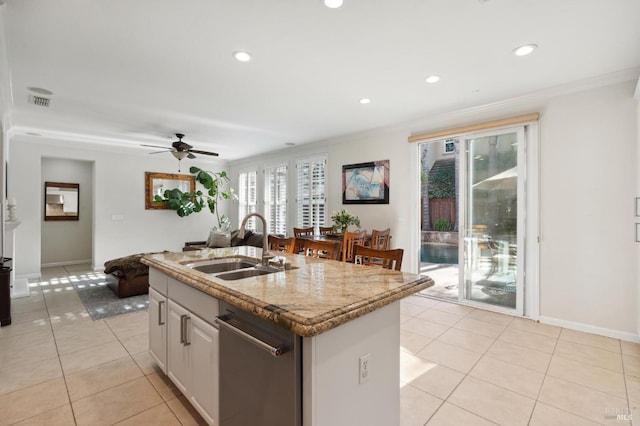 7 Oak Grove Dr, Novato, CA 94949 - kitchen with a sink, light tile patterned floors, light stone counters, stainless steel dishwasher, and an island with sink