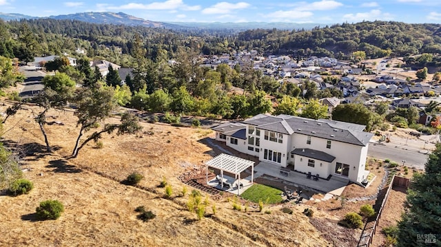 bird's eye view with a mountain view