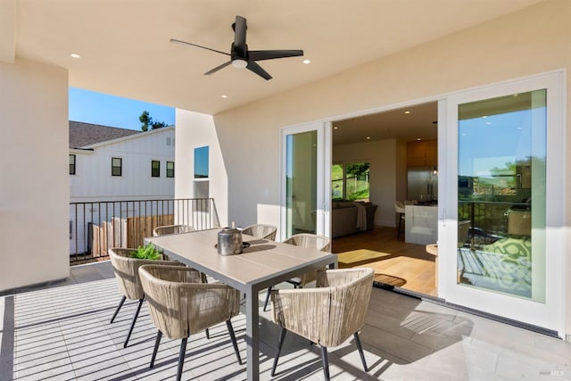 view of patio featuring ceiling fan