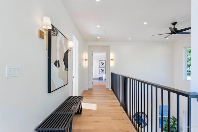 hall with light hardwood / wood-style floors