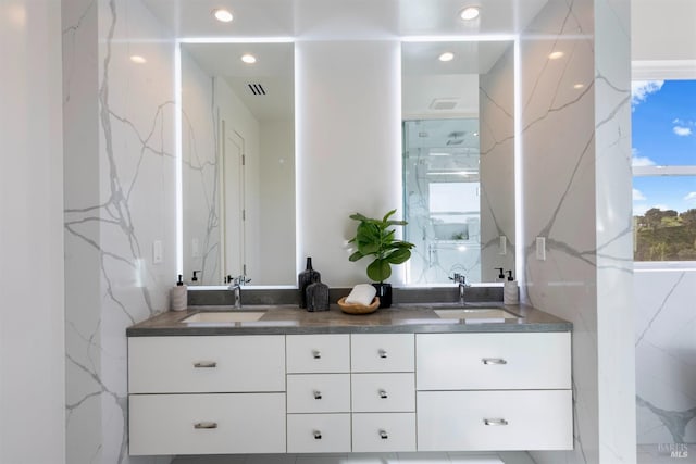 bathroom featuring vanity and plenty of natural light