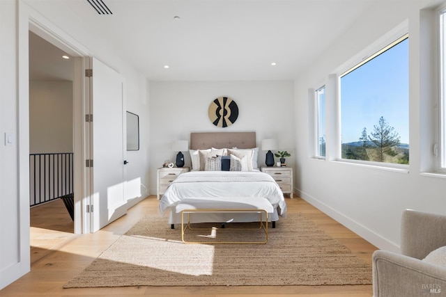 bedroom featuring light hardwood / wood-style floors