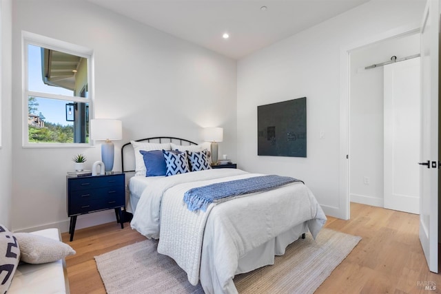 bedroom featuring light wood-type flooring