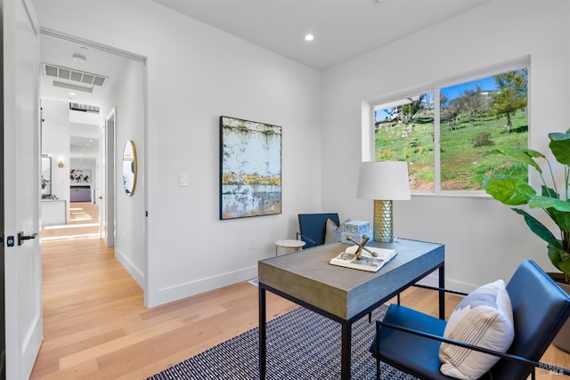 home office featuring light wood-type flooring