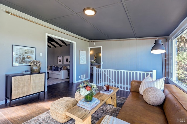 living room featuring dark wood-type flooring