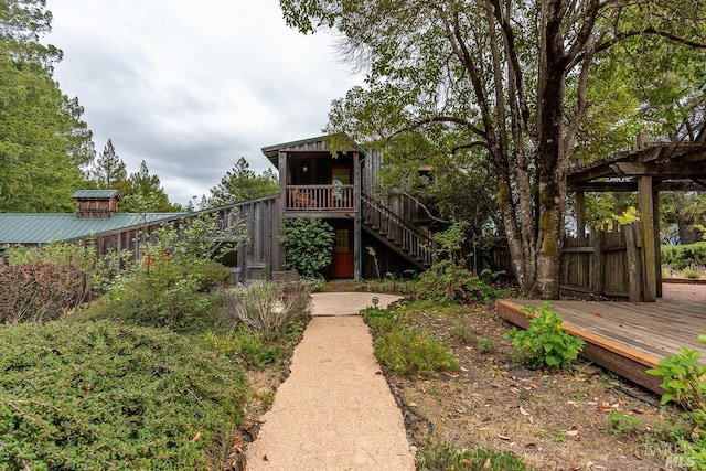 exterior space featuring a wooden deck