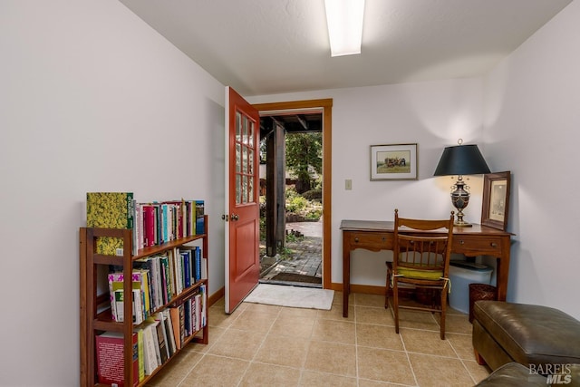 interior space with light tile patterned floors