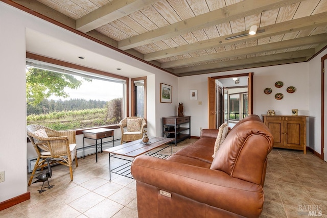 2151 Guntly Rd, Philo, CA 95466 - living room featuring wood ceiling, healthy amount of natural light, light tile patterned floors, beamed ceiling, and baseboards