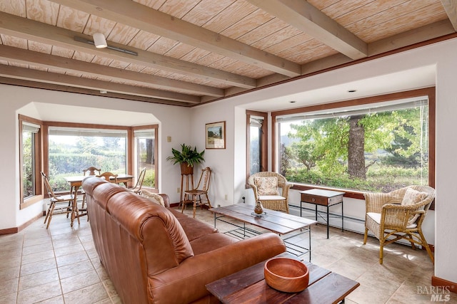 living room featuring wooden ceiling, light tile patterned flooring, a baseboard heating unit, and beamed ceiling