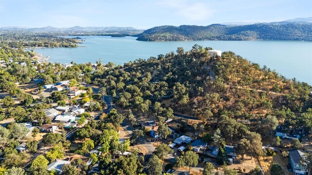 bird's eye view with a water and mountain view