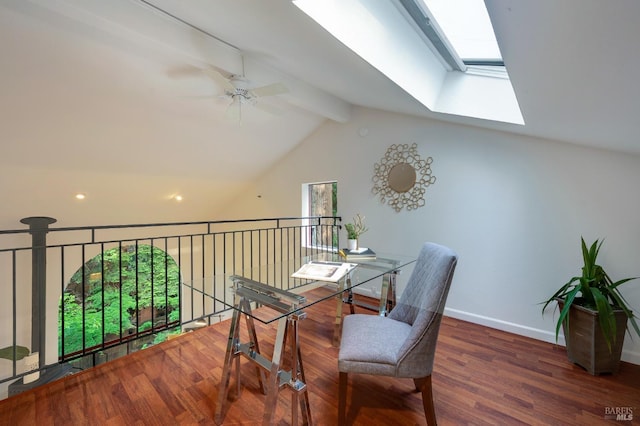 home office featuring vaulted ceiling with skylight, ceiling fan, and dark hardwood / wood-style floors