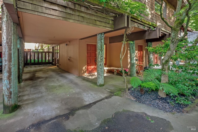 view of patio / terrace with a carport