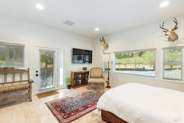 bedroom featuring access to outside, multiple windows, visible vents, and recessed lighting