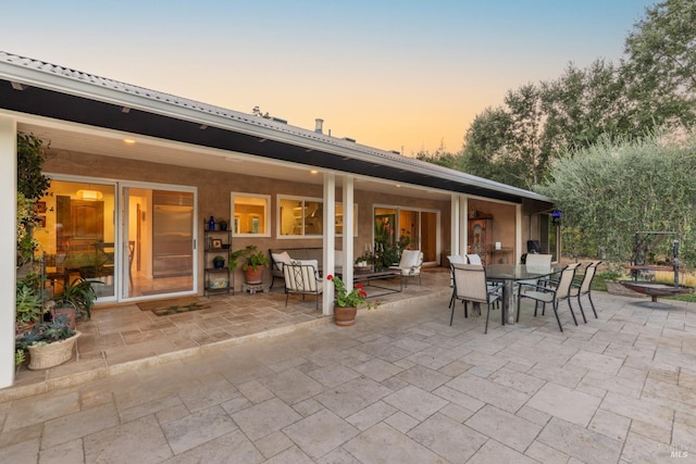 view of patio with outdoor dining area