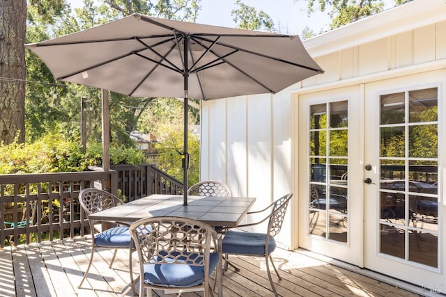 deck featuring french doors and outdoor dining space