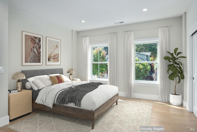 bedroom featuring light hardwood / wood-style flooring