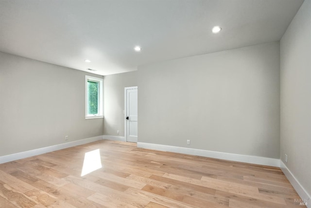 empty room featuring light hardwood / wood-style floors