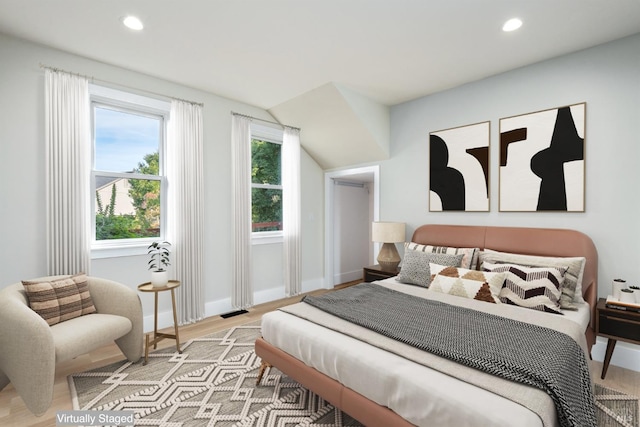 bedroom featuring light hardwood / wood-style flooring