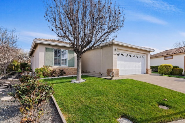 single story home with a garage, concrete driveway, brick siding, and a front yard