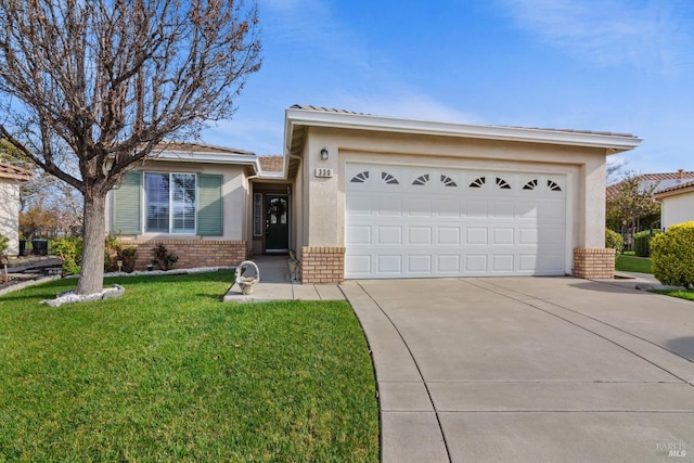 ranch-style home featuring an attached garage, brick siding, driveway, stucco siding, and a front yard