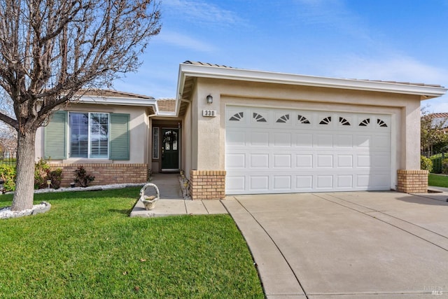 ranch-style house featuring brick siding, concrete driveway, an attached garage, a front yard, and stucco siding