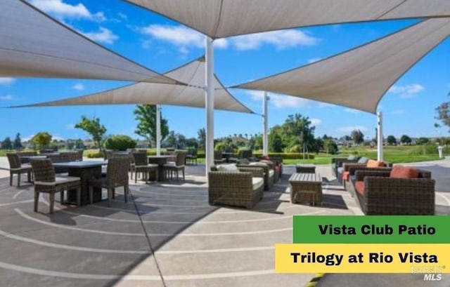 view of patio / terrace featuring outdoor dining area and an outdoor living space