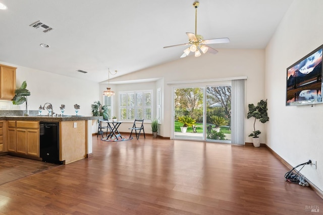 kitchen with lofted ceiling, ceiling fan, dark wood finished floors, and visible vents