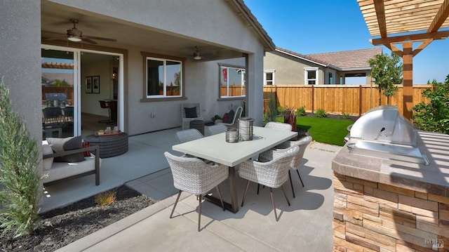 view of patio with a pergola, area for grilling, and ceiling fan