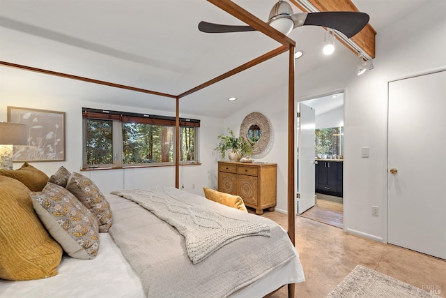 bedroom featuring ceiling fan, lofted ceiling, and connected bathroom