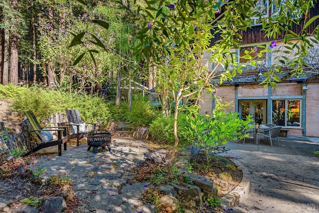 view of patio / terrace with a fire pit