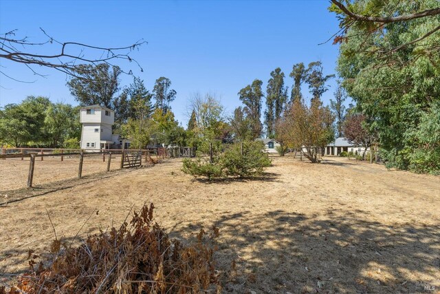 view of yard featuring a rural view