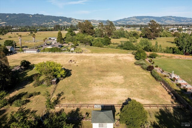 bird's eye view featuring a mountain view and a rural view