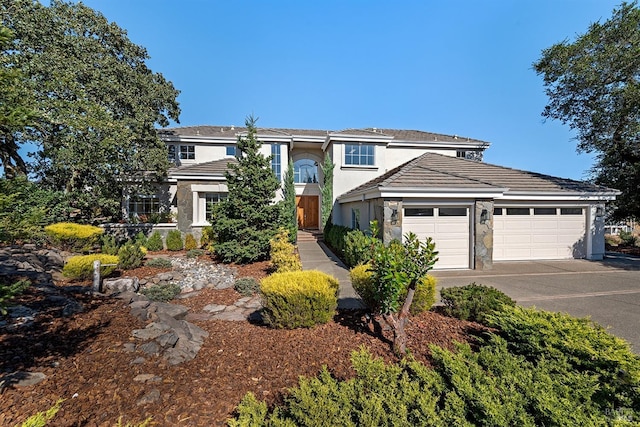 view of front of property featuring a garage