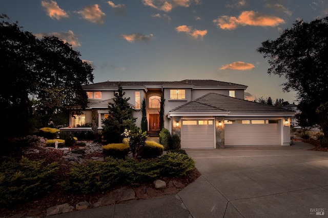 view of front of property featuring a garage