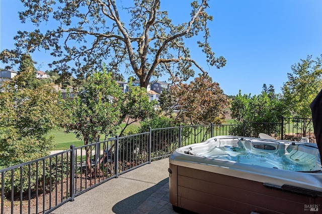 view of patio featuring a hot tub