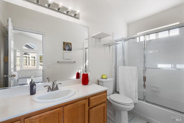 full bathroom with tile patterned flooring, vaulted ceiling, vanity, enclosed tub / shower combo, and toilet