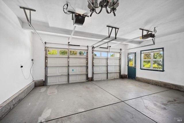 garage featuring a garage door opener