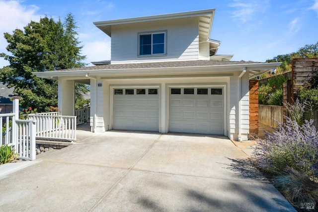 view of front of property with a garage