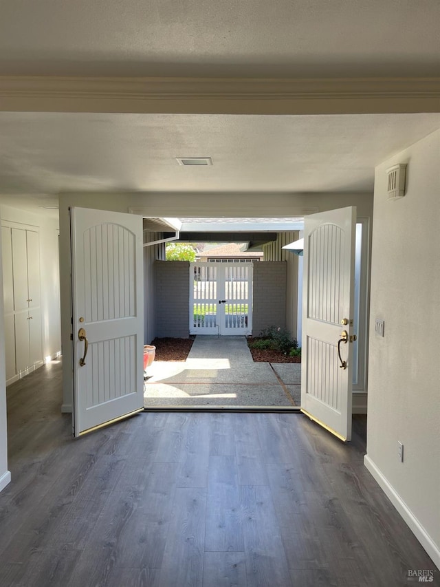 unfurnished room featuring dark hardwood / wood-style flooring