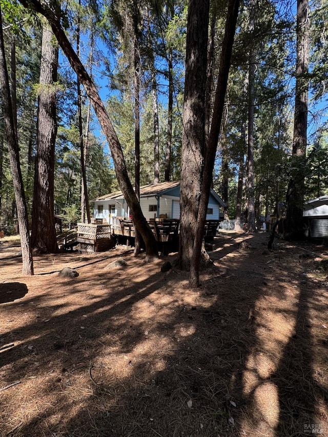 view of yard with a deck