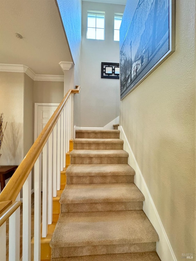 stairs with crown molding