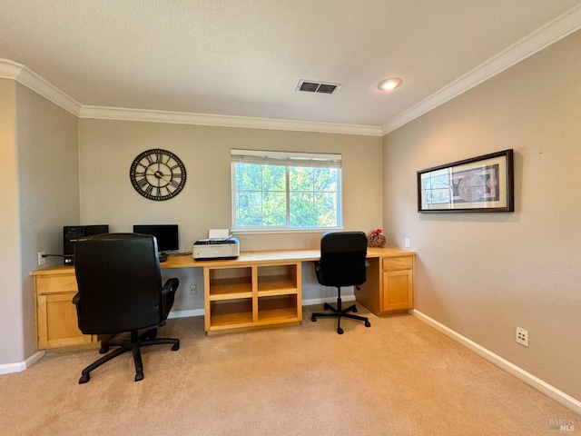 carpeted office space with crown molding