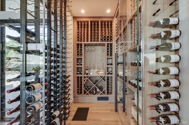 wine cellar featuring wood finished floors
