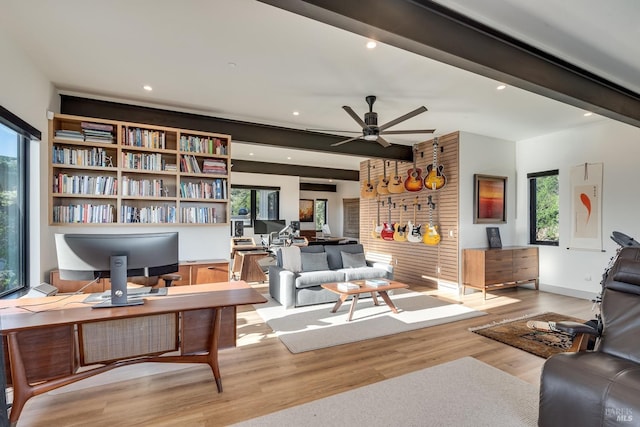 living room featuring light wood-type flooring, ceiling fan, beam ceiling, and recessed lighting