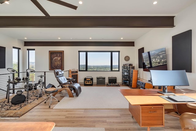 living room featuring beamed ceiling, light wood finished floors, and recessed lighting
