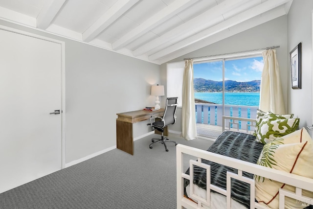 home office with vaulted ceiling with beams, a water view, and carpet