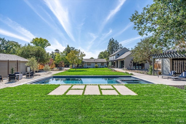 view of swimming pool with a patio area and a lawn