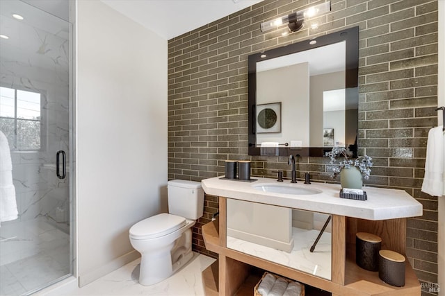 bathroom with vanity, a shower with shower door, and toilet