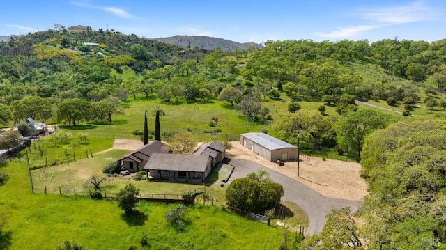 aerial view with a mountain view and a rural view