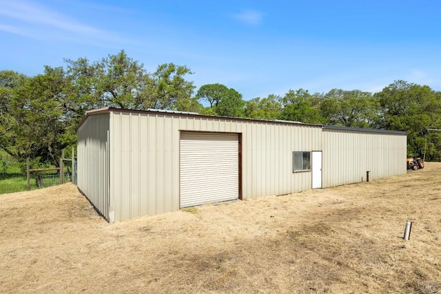 view of outdoor structure with a garage